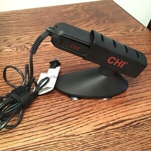 CHI Ceramic Flat Iron with holster. (Travel Size).